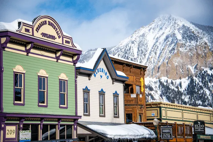 Crested Butte downtown with shops and snowy mountain backdrop