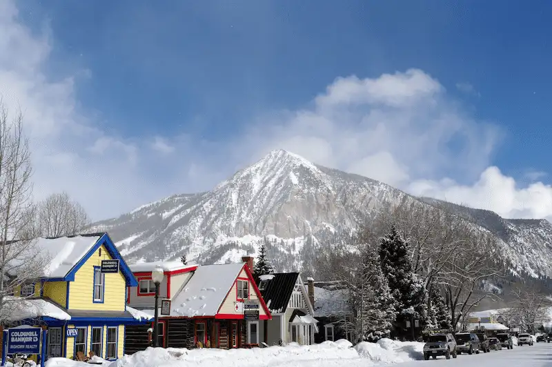 Crested Butte historic colorful downtown in winter with mountains