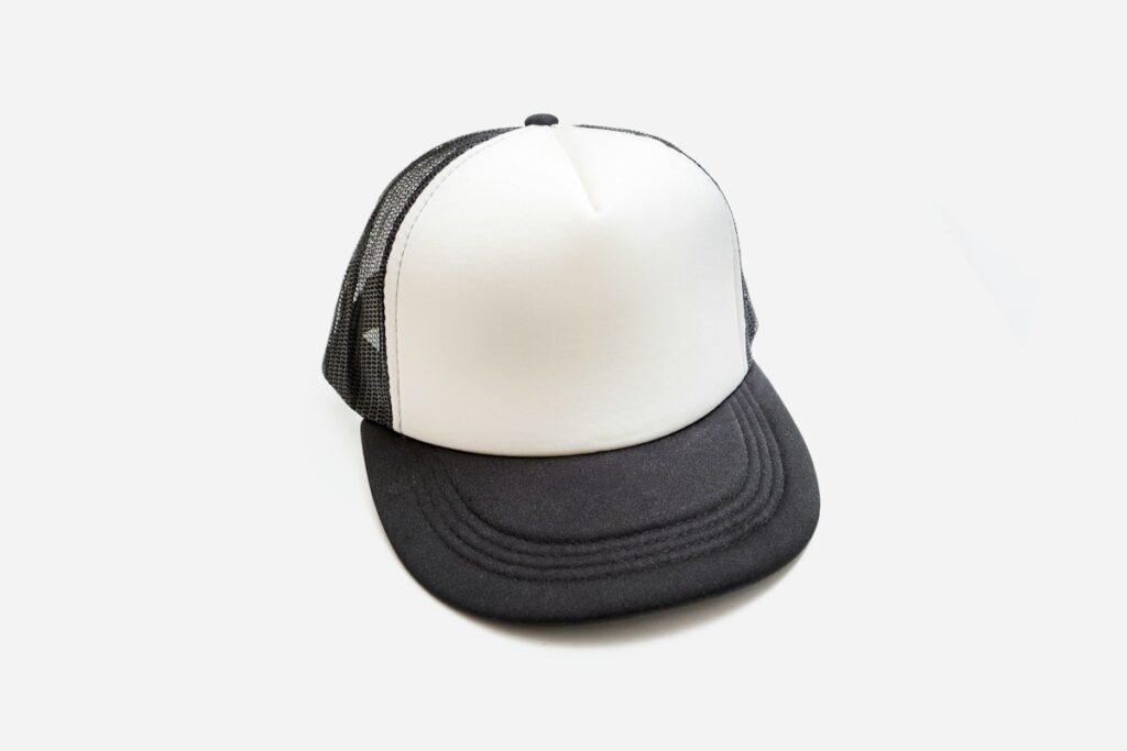 Town to Mountain Winter Golf Hat Mockup Base Black golf hat for the Town to Mountain Express winter reservation promotion